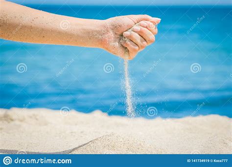 Hands Are Pouring Sand By The Sea Stock Image Image Of Hands Pouring