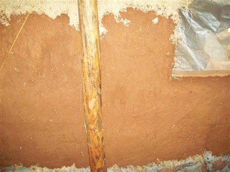 Solar Compound Mud Plastering The Inside Of The House