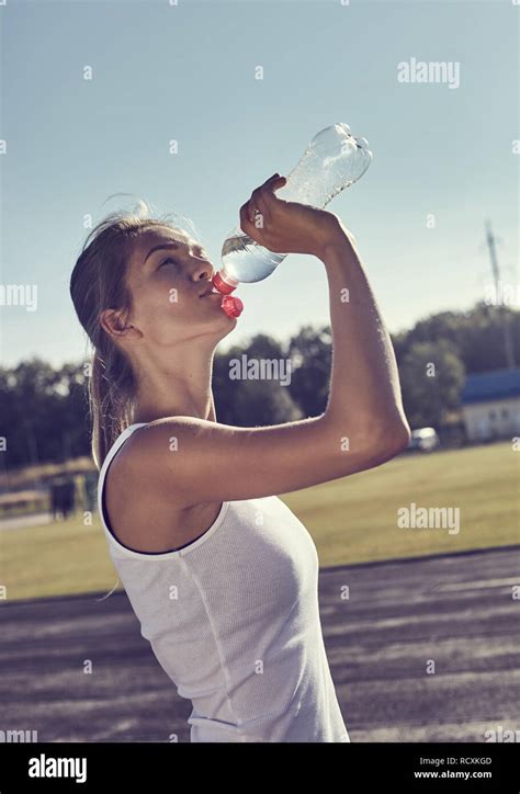 Fitness Woman Drinking Water Stock Photo Alamy