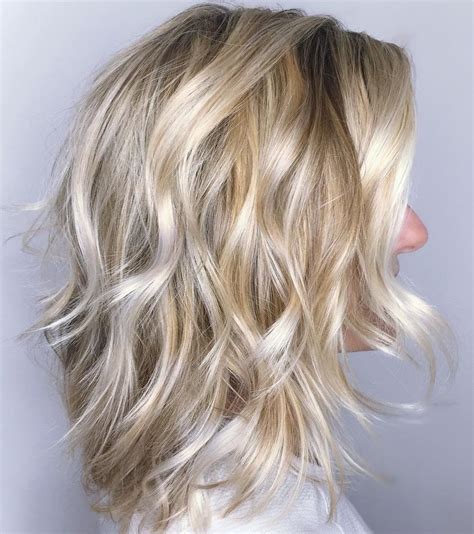 Blonde Wavy Shag With Platinum Highlights Modern Shag Haircut Hair
