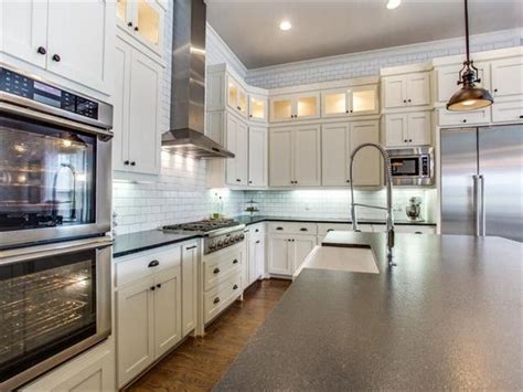 The homeowner wanted a new white kitchen, but loves the bit of wall color above the cabinets and needed display space for ceramics. For the Most Discerning Buyer, Lakewood Home Hits All High ...