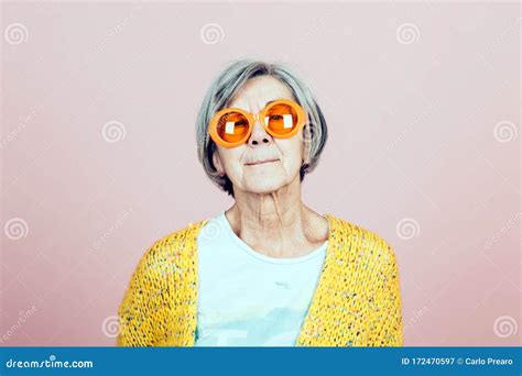Portrait Of A Cool Grandma On Pink Background Stock Image Image Of