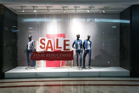 Fashion Clothes Shop Display Window And Sale Sign Salient Graphics