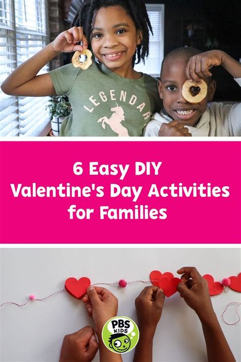 A Young Girl And Boy Hold Up Valentines Day Crafts They Made