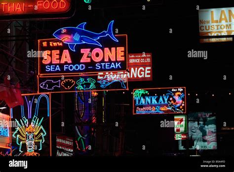 Neon Signs Outside Seafood Restaurants In The Walking Street A Section