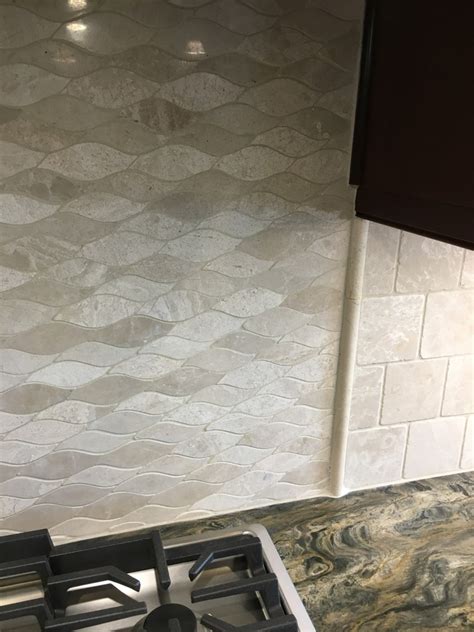 Installing a subway tile backsplash into your kitchen provides both an updated look (that will tip: Wave travertine backsplash tile - Transitional - Kitchen ...