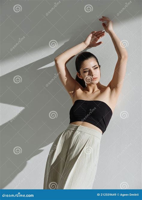 Pretty Woman Holding Her Hands Above Her Head Fashion Clothing Model Stock Image Image Of