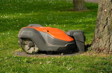 Robotic Lawn Mower On Green Grass Backgroundautomatic Robot Lawnmower