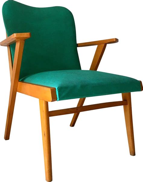 Wooden armchairs vintage are also offered with features such as extra footrests, and adjustable height. Vintage wooden and green vinyl armchair with compass feet ...
