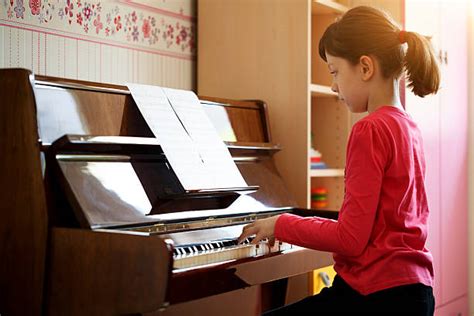 Royalty Free Girl Playing Piano Pictures Images And Stock Photos Istock