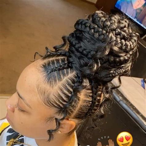 Feed in braids are a popular protective style that's created with hair extensions which are fed into each braid starting near the roots of the hair. Chicago🌆🤗Hairstylist ️😍 on Instagram: "StitchBraids Boho Bun - - - - - - - - - - … | Feed in ...
