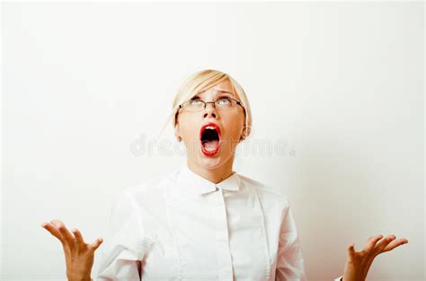 Very Emotional Businesswoman In Glasses Blond Hair On White Background Teacher Hands Up Posing