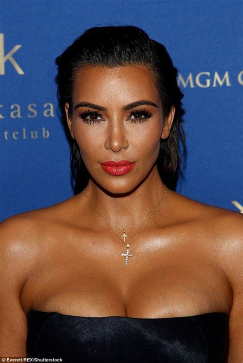 Kim Kardashian Shows Off Her Hourglass Figure In Strapless Silk Dress