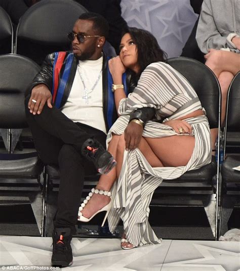 Diddy Cuddles Cassie As She Flashes Thigh At La Nba Game Daily Mail Online