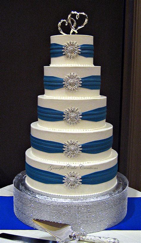 Elegant White Buttercream Wedding Cake With Royal Blue