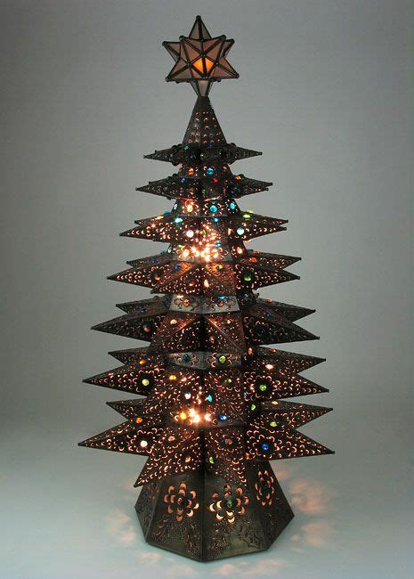 Get ready for christmas with poundland! Lighted Punched Tin Star Christmas Tree with Marbles ...