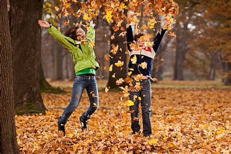 Jumping In Leaves Stock Photos Pictures And Royalty Free Images Istock