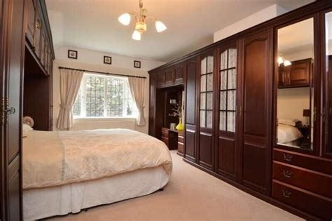 34 Mahogany Fitted Wardrobes Background