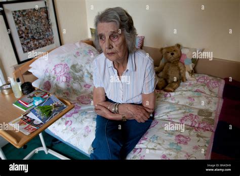 Sad Elderly Woman In Care Home Stock Photo Alamy