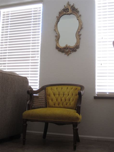 Vintage Gold Cane Barrel Arm Chair and Syrocco Gold Ornate Oval Mirror