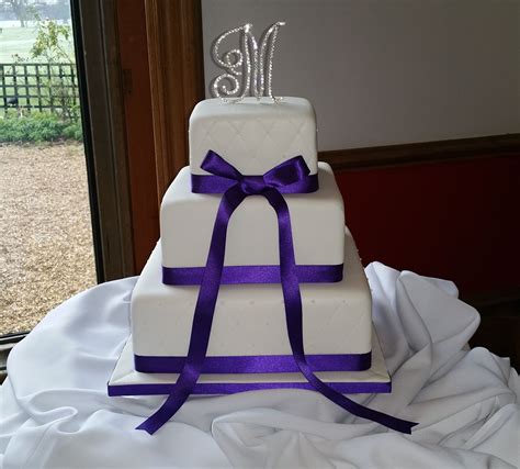 3 Tier Square Wedding Cake Quilted Effect On Top And Bottom Tier With