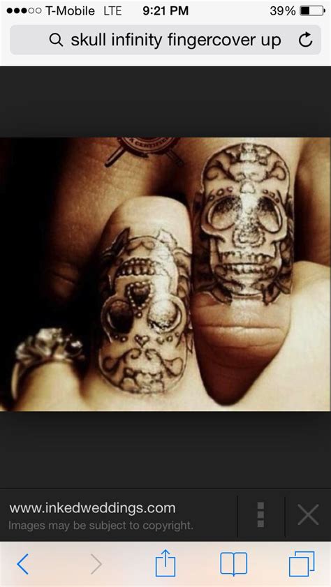 The skull on upper arm is covering an existing tribal tattoo. Cover up idea | Skull finger tattoos, Ring finger tattoos, Sugar skull tattoos