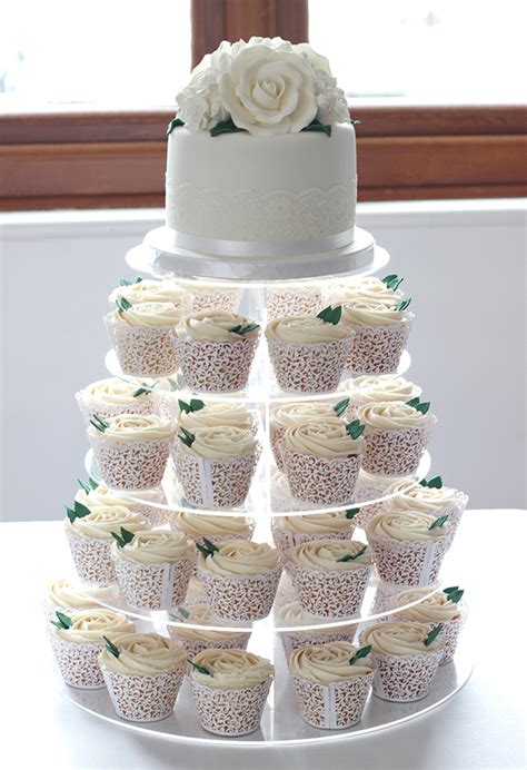 Prepare a stand mixer with a whisk attachment. White Roses Wedding Cake & Cupcakes - Cakey Goodness