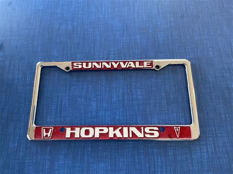 Vintage Sunnyvale California Hopkins Pontiac Dealership License Plate Frame Oldsmobile Obsolete