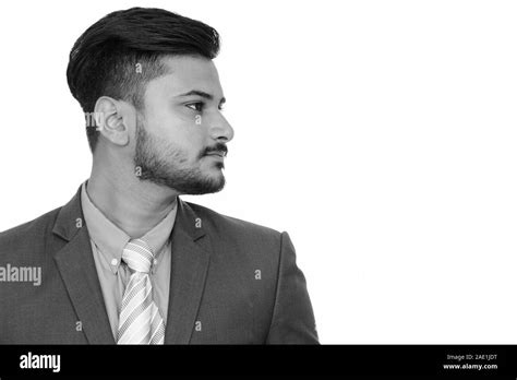 Side View Of Young Handsome Indian Businessman Stock Photo Alamy