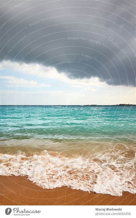Stormy Clouds Over A Tropical Beach A Royalty Free Stock Photo From