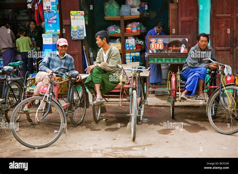 Myanmar Burma Nyaung U The Owners Of Bicycle Taxis With Sidecars