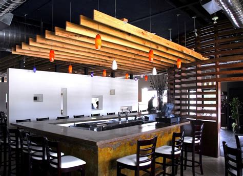 Wood slats add texture and warmth to these homes. Image result for bar ceiling | Wood slat wall, Wood slat ...