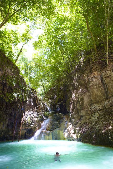 this tour lets you jump down the dominican republic s 27 waterfalls