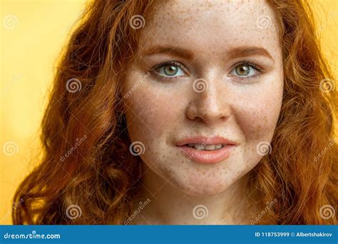 Close Up Of Beautiful Red Haired Freckled Girl With Loose Curly Hair