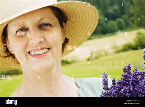 Woman Wearing Sun Hat Stock Photo Alamy
