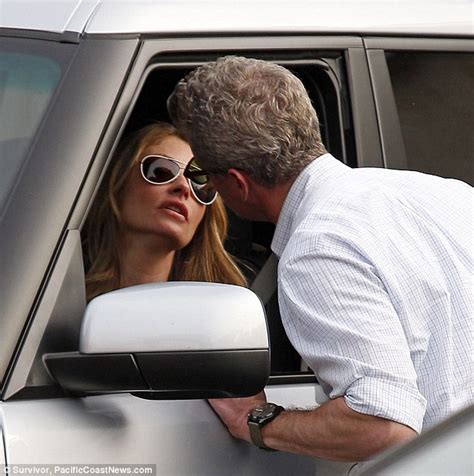 Well He Is Mcsteamy Eric Dane Kisses Rebecca Gayheart Through Her Car