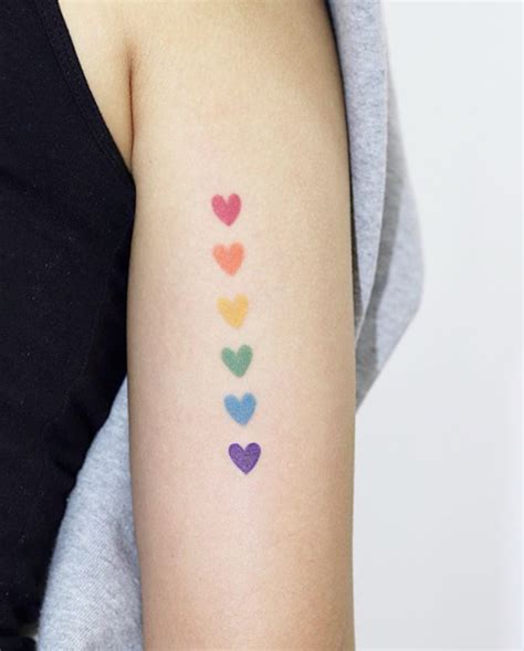 rainbow hearts arm tattoo rainbow tattoos rainbow heart tattoo tiny heart tattoos