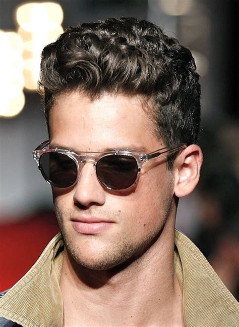 Curly shaved hairstyles for men one way to show off your superb curls as a guy is to create a fake mohawk out of them. Good Hairstyles For Curly Hair Men 0015