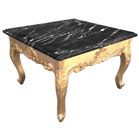 Modern high gloss chipboard coffee tea table furniture for home living room use. Square coffee table baroque style wood gilded with gold leaf and black marble top.