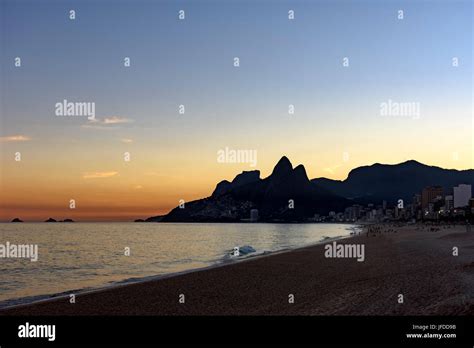 Summer Sunset At Ipanema Beach In Rio De Janeiro With Two Brothers Hill