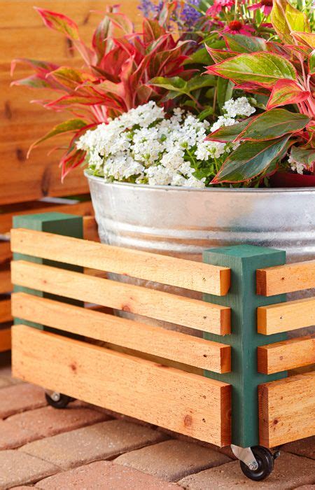 The handles make it easy for two people to move the tubs around the garden. Make a roll-away planter with just a few tools. A ...