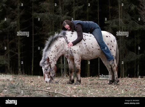 Girl Cuddling Pony Hi Res Stock Photography And Images Alamy