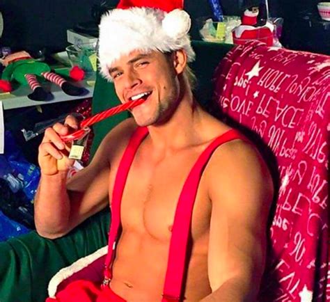 Literally Just A Bunch Of Shirtless Dudes Wearing Santa Hats