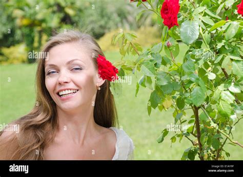 Woman With That Among Flowers Hi Res Stock Photography And Images Alamy