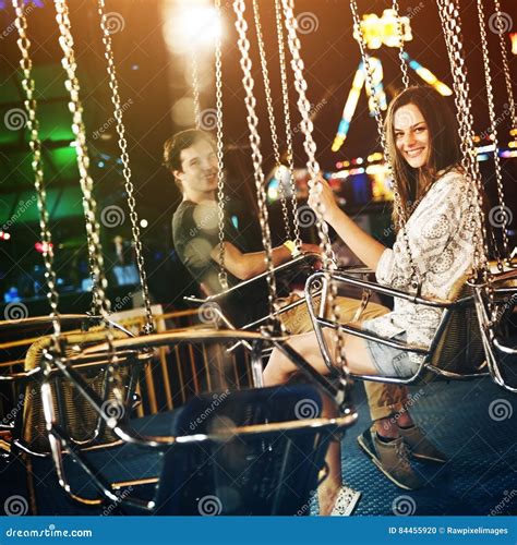 Woman Carnival Ride Riding Happiness Fun Concept Stock Photo - Image of