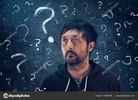 Confused Man With So Many Questions Stock Photo By ©stevanovicigor