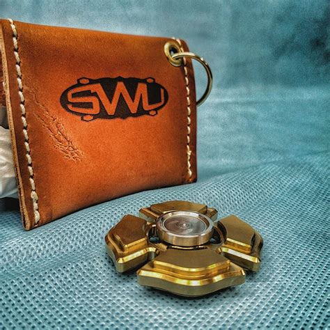 Beautiful Leather Pouches Included With Brass Downtime Spinners