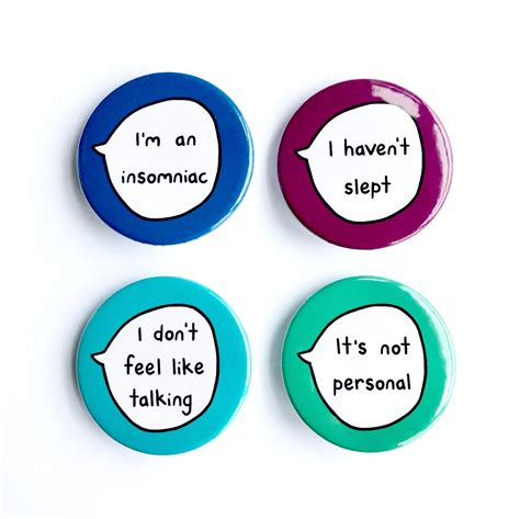 three buttons with words on them that say i m an insomniac i don t feel like talking