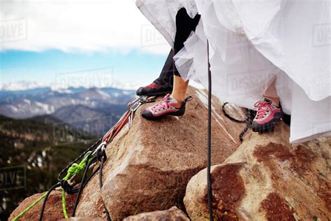 Feet Of Rock Climbing Couple Stock Photo Dissolve