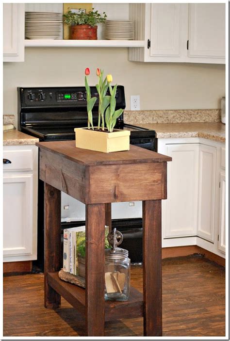 Attach a black iron floor flange fitting to one of the ½ inch diameter by 18 inch long pieces of pipe. 30 Rustic DIY Kitchen Island Ideas